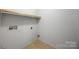 Simple utility room with hookups, neutral paint, and basic flooring at 4219 Shasta Cir, Clover, SC 29710