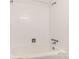 Bathroom featuring white tiled shower and tub at 4925 Seacroft Rd, Charlotte, NC 28210