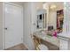 Bathroom features a vanity area with granite countertops, and a custom lighted mirror at 7324 Pebblestone Dr # E, Charlotte, NC 28212