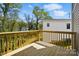 Enjoy the view from the wooden deck of this home overlooking the backyard at 74 Snyder Ne Ct, Concord, NC 28025