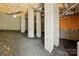 The foundation of this home features an unfinished basement with support columns at 74 Snyder Ne Ct, Concord, NC 28025