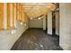 An unfinished basement with cinder block walls and support columns at 74 Snyder Ne Ct, Concord, NC 28025
