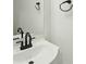 Bathroom featuring modern fixtures, clean design, and a white sink at 74 Snyder Ne Ct, Concord, NC 28025