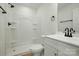 A bathroom featuring a shower, toilet, and vanity with modern finishes at 74 Snyder Ne Ct, Concord, NC 28025