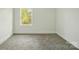 Bedroom with a window and neutral carpeting at 74 Snyder Ne Ct, Concord, NC 28025