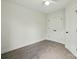 Bedroom with neutral carpeting and a double-door closet at 74 Snyder Ne Ct, Concord, NC 28025