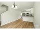 Spacious living room connects seamlessly with the kitchen, creating an ideal space for entertaining at 74 Snyder Ne Ct, Concord, NC 28025
