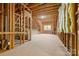 Unfinished attic space with exposed wood framing and insulation at 7600 Brookmont Ln, Waxhaw, NC 28173