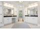 Bathroom featuring double vanity sinks, granite countertop, white cabinetry, and tiled floors at 7600 Brookmont Ln, Waxhaw, NC 28173