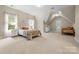 Bedroom featuring carpet, two windows, a white dresser, and a twin size bed at 7600 Brookmont Ln, Waxhaw, NC 28173
