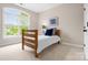 Bedroom featuring carpet, and a large window providing ample natural light at 7600 Brookmont Ln, Waxhaw, NC 28173