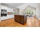 Spacious kitchen featuring a center island, stainless appliances, and a breakfast nook area at 7600 Brookmont Ln, Waxhaw, NC 28173