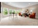 Spacious living room with large windows and stylish furnishings at 7600 Brookmont Ln, Waxhaw, NC 28173