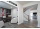 Well-lit office space with custom built-in shelving, a large desk, and neutral decor at 8419 Everwood Ave, Huntersville, NC 28078