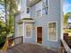 The backyard features a cozy wooden deck, ideal for outdoor relaxation and entertaining at 845 Creek Bluff Rd, Rock Hill, SC 29732