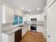 Modern kitchen with granite countertops, stainless steel appliances, and white cabinetry at 845 Creek Bluff Rd, Rock Hill, SC 29732