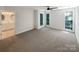 Spacious main bedroom with carpet, ceiling fan, and ensuite bathroom at 845 Creek Bluff Rd, Rock Hill, SC 29732