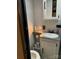 Compact bathroom featuring a white vanity, sink, and medicine cabinet at 103 Hidaway Trl # 99A, Mount Gilead, NC 27306