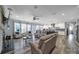 Spacious living room with hardwood floors and seamlessly open to the kitchen and dining areas at 10416 Glenmac Rd, Charlotte, NC 28215