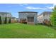 Large backyard with a screened porch and wooden deck perfect for outdoor enjoyment and entertaining guests at 10423 Drake Hill Dr, Huntersville, NC 28078