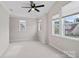 Spacious bedroom with large windows and plush carpeting at 10423 Drake Hill Dr, Huntersville, NC 28078