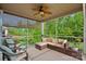 Inviting screened porch with comfortable seating and scenic views at 10423 Drake Hill Dr, Huntersville, NC 28078