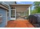 Screened in porch with outdoor seating and access to the deck at 10423 Drake Hill Dr, Huntersville, NC 28078
