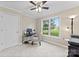 Bedroom with natural light from the large window and a desk for a home office setup at 109 Wren Ln, Mooresville, NC 28117