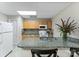 Kitchen with granite countertop and oak cabinets, including modern appliances for a functional space at 109 Wren Ln, Mooresville, NC 28117