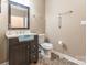 Charming powder room features modern vanity, tiled floors, and a stylish mirror for added appeal at 1308 Twin Oaks Dr, Chester, SC 29706