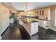 Spacious kitchen with island, granite counters, stainless steel appliances, and hardwood floors at 1308 Twin Oaks Dr, Chester, SC 29706