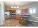 Functional kitchen features stainless steel appliances, ample wood cabinets, and a breakfast bar for casual dining at 1308 Twin Oaks Dr, Chester, SC 29706