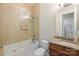 The bathroom showcases a shower-over-tub, complemented by a sleek glass screen and a coordinated vanity at 133 Crooked Branch Way, Troutman, NC 28166