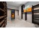 Walk-in Closet featuring ample dark wood shelving and storage space at 133 Crooked Branch Way, Troutman, NC 28166