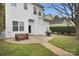 Private backyard with patio, bench, grill, and lush greenery at 140 Parkview St, Davidson, NC 28036