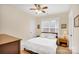 Bedroom featuring neutral color palette, soft carpet, and ample natural light at 140 Parkview St, Davidson, NC 28036