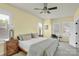 Bedroom with neutral color scheme, comfortable bed, and lots of natural light at 140 Parkview St, Davidson, NC 28036