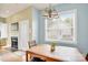 Eat-in dining area with wood table, chandelier, and natural light at 140 Parkview St, Davidson, NC 28036