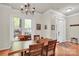 Bright dining room with a wooden table and cozy decor, perfect for enjoying meals with Gathering and friends at 140 Parkview St, Davidson, NC 28036