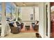Relaxing front porch with comfortable seating, creating a welcoming outdoor living space at 140 Parkview St, Davidson, NC 28036