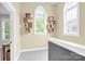 Upstairs hallway with decorative shelving and natural light at 140 Parkview St, Davidson, NC 28036