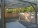 Backyard features a wooden pergola, gray gravel and a paved patio area at 1401 Anderson St, Charlotte, NC 28205
