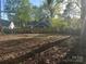 Spacious backyard featuring a tall privacy fence at 1401 Anderson St, Charlotte, NC 28205
