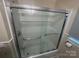 This bathroom has a tiled tub with glass doors and chrome fixtures at 1401 Anderson St, Charlotte, NC 28205