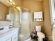 Bathroom featuring updated fixtures, a shower, and a white vanity at 14522 Waterside Dr, Charlotte, NC 28278