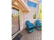 Home's porch featuring comfortable blue chairs perfect for relaxing outdoors at 14522 Waterside Dr, Charlotte, NC 28278