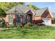 Charming brick home with a well-manicured lawn and landscape, plus an attached two-car garage at 1511 Elkhart Cir, Gaston, NC 28054