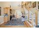 Bright foyer featuring staircase, hardwood floors, and stylish decor, creating a welcoming atmosphere at 1511 Elkhart Cir, Gaston, NC 28054