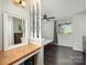 Bedroom featuring neutral walls, hardwood floors, and a mirror at 158 Water Oak Dr, Pineville, NC 28134