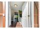 View through the front door reveals a modern entryway with stylish flooring and bright, airy design at 158 Water Oak Dr, Pineville, NC 28134